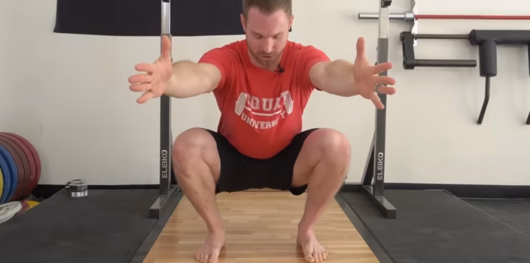Comment maîtriser la technique squat barre quand on débute ?
